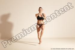 Underwear Martial art Woman White Moving poses Average long colored Dynamic poses Academic